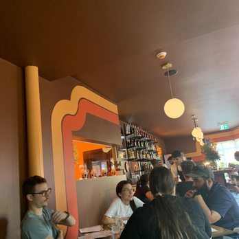Retro Gusto - a group of people sitting at a table - Italian Near Me - Ottawa, Ontario