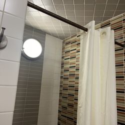 One of several photos of the rusted shower, rods