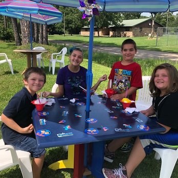 Snobros - a group of children sitting around a table - Shaved Ice Near Me - Ocean Springs, Mississippi Snobros - a group of children sitting around a table - Shaved Ice Near Me - Ocean Springs, Mississippi