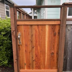 S&L Contracting - Cedar gate added to match existing fencing