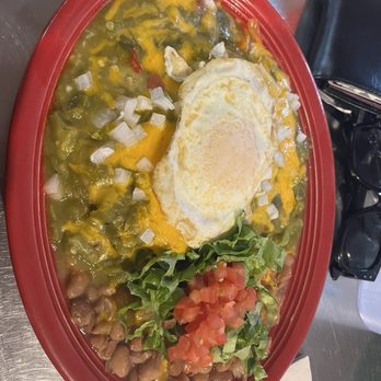 Carne Adovada enchiladas with a fried egg