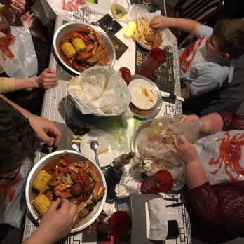 The Tasty Crab - Table full of happy diners! - Cajun/Creole Near Me - Bloomington, Illinois The Tasty Crab - Table full of happy diners! - Cajun/Creole Near Me - Bloomington, Illinois