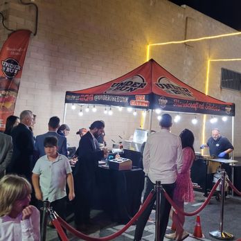 Under The Bun - a crowd of people standing around a tent - Food Trucks Near Me - Los Angeles, California