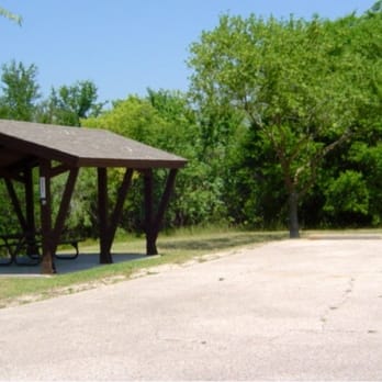 Taylor Park Campground - Campsite #31. Covered picnic table, fire pit, BBQ grill, room for 2 tents & 2 cars. A trail through the woods goes to the lake. - Campgrounds Near Me - Taylor, Texas