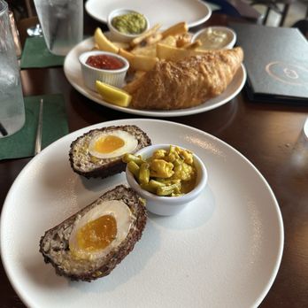 The Grumpy George Pub & Grub - Fish and chips with an scotched egg - Pubs Near Me - Georgetown, Texas The Grumpy George Pub & Grub - Fish and chips with an scotched egg - Pubs Near Me - Georgetown, Texas