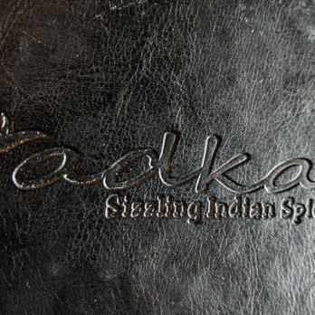 Tadka - Sizzling Indian Spices - a closeup of the logo - Indian Near Me - Toronto, Ontario Tadka - Sizzling Indian Spices - a closeup of the logo - Indian Near Me - Toronto, Ontario