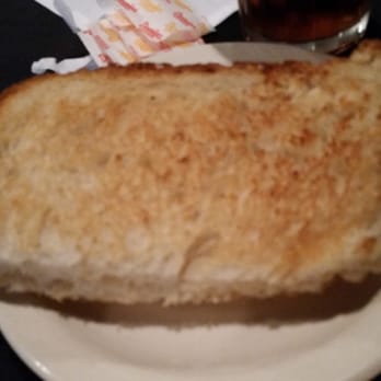 Bagheri's Restaurants - Large slices of complimentary bread - Italian Near Me - Denton, Texas Bagheri's Restaurants - Large slices of complimentary bread - Italian Near Me - Denton, Texas