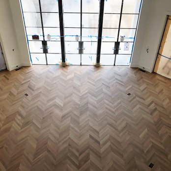 Mack Custom Wood Floors - chevron pattern rift sawn white oak floors, installed and finished with invisible finish - Flooring Near Me Mack Custom Wood Floors - chevron pattern rift sawn white oak floors, installed and finished with invisible finish - Flooring Near Me