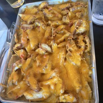 Game On Bar & Grill - Loaded fries with crispy chicken (but without the sour cream and scallions at my kid's request) - Sports Bars Near Me - Leander, Texas