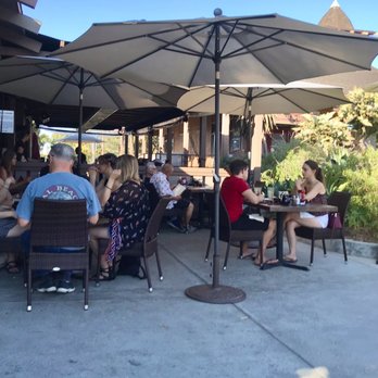 RJ's Cafe - Outdoor dining area. Behind these tables is a bigger (covered) patio dining area. - Breakfast & Brunch Near Me - Dana Point, California RJ's Cafe - Outdoor dining area. Behind these tables is a bigger (covered) patio dining area. - Breakfast & Brunch Near Me - Dana Point, California