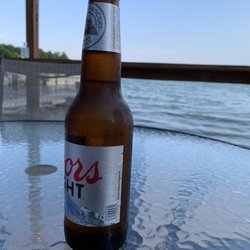 Wapogasset Waterside Bar & Grill - Patio dining on the water