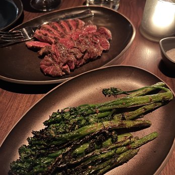 Matu - 12 oz ribeye and Broccolini, garlic, red pepper flakes - Steakhouses Near Me - Beverly Hills, California Matu - 12 oz ribeye and Broccolini, garlic, red pepper flakes - Steakhouses Near Me - Beverly Hills, California