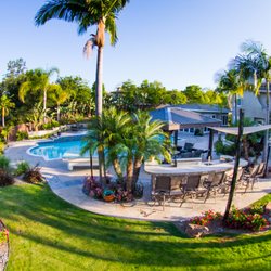 teamG7 - Tropical BBQ and pool with overhead shade structures