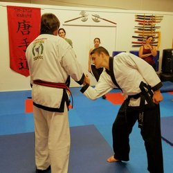 Teaching a wrist lock to a self defense class.