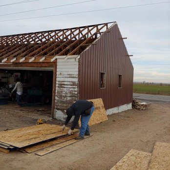 DG Roofing & Construction - Redeck. Walls and roof with some beautiful R panel - Flooring Near Me - Del Valle, Texas