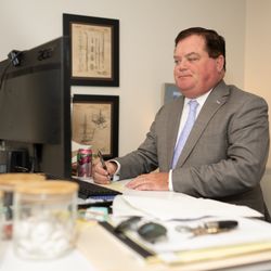 Munley Law Personal Injury Attorneys Scranton - Munley Law personal injury attorney John Mulcahey working at his desk