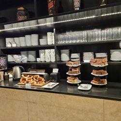 American Express Centurion Lounge - Coffee and snack/dessert station. Choice of media Lunas, brownies, and cakes.
