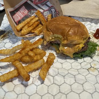 BunSlut - Single, smashed patty with cheese, added lettuce and tomato. And an order of seasoned fries. - Burgers Near Me - Missouri City, Texas BunSlut - Single, smashed patty with cheese, added lettuce and tomato. And an order of seasoned fries. - Burgers Near Me - Missouri City, Texas