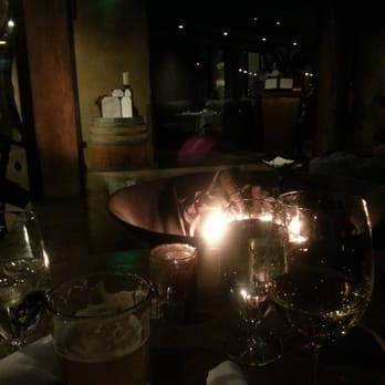 PlumpJack Cafe and Bar - Bar seating by the open fire - New American Near Me - Olympic Valley, California PlumpJack Cafe and Bar - Bar seating by the open fire - New American Near Me - Olympic Valley, California