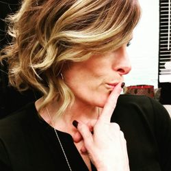 Bangz Art & Hair Salon - Short stacked bob with wavy hair and an ombre for hair color. This cut and color has a very trendy sexy look to it.
