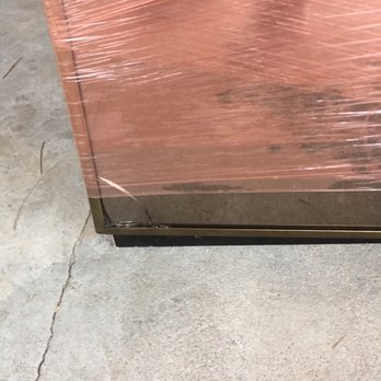 Cross Country Moving Group - Broken Glass cabinet - Movers Near Me - Delray Beach, Florida