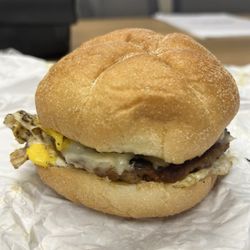 The Blue Arrow Cafe - Sausage, egg, and cheese. Perfect egg/meat to bun ratio.