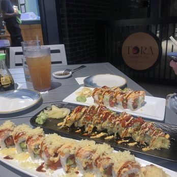 Tora Sushi & Bar - Middle roll is Hunky Dori. Not sure the other two- sorry I took this on a past visit. - Sushi Bars Near Me - Charlotte, North Carolina Tora Sushi & Bar - Middle roll is Hunky Dori. Not sure the other two- sorry I took this on a past visit. - Sushi Bars Near Me - Charlotte, North Carolina