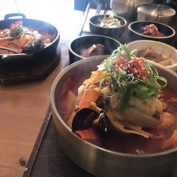 Table Sodam - sea food soup, and toekpokki in the back - Korean Near Me - Ottawa, Ontario