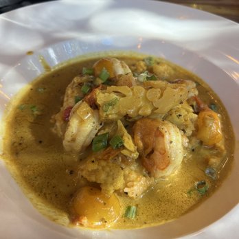Common Restaurant - Curry shrimp and grits. - Cocktail Bars Near Me - Savannah, Georgia Common Restaurant - Curry shrimp and grits. - Cocktail Bars Near Me - Savannah, Georgia