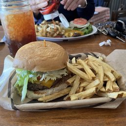 Big juicy burger, and fries Big juicy burger, and fries