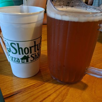 Shorty's Pizza Shack - A personal pitcher of beer. Next to wife's soda. - Pizza Near Me - Waco, Texas