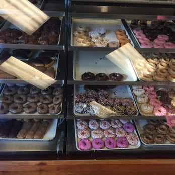 Heavenly Donuts - Pictures of the display case of various assorted donuts. - Donuts Near Me - Redding, California Heavenly Donuts - Pictures of the display case of various assorted donuts. - Donuts Near Me - Redding, California