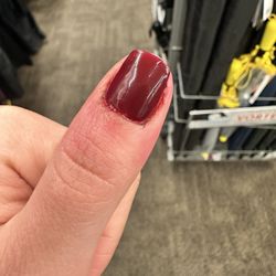 Sky Nails & Spa - Painted thumbnail that is bleeding