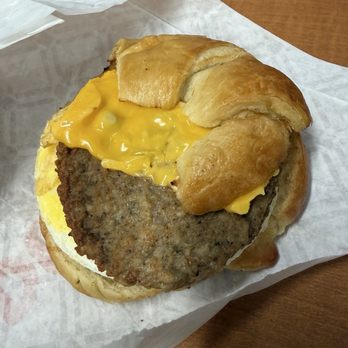 Dunkin' - Sausage Egg and Cheese Breakfast Sandwich. Lacking the croissant top of the sandwich. - Donuts Near Me - Carmichael, California