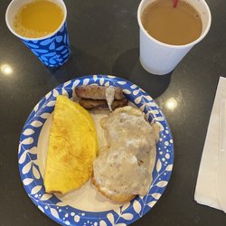 Holiday Inn Express & Suites - Kingdom City - Biscuits and gravy, egg and cheese omelet, sausage, oj and coffee. Also had the cinnamon roll too. All was delicious!
