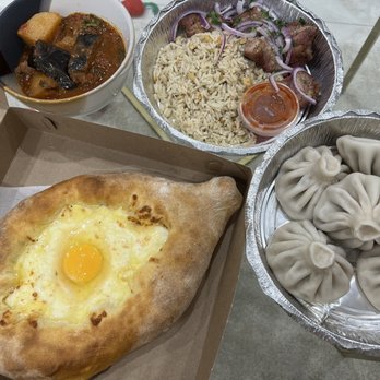Kartveli - Lamb stew, pork Lula Kebabs, Lamb Khinkali 6 pcs and  Acharuli Khachapuri - Georgian Near Me - Brooklyn, New York