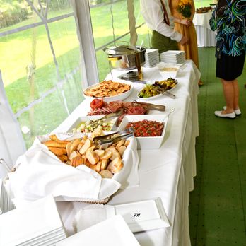 Glen Iris Inn - a buffet table with food on it - Bed & Breakfast Near Me - Castile, New York Glen Iris Inn - a buffet table with food on it - Bed & Breakfast Near Me - Castile, New York