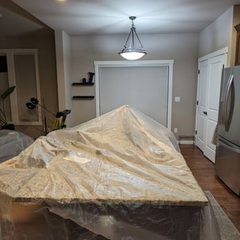 Hawthorne Electric - Remove the pendant fixture and install can lights. Before - Electricians Near Me