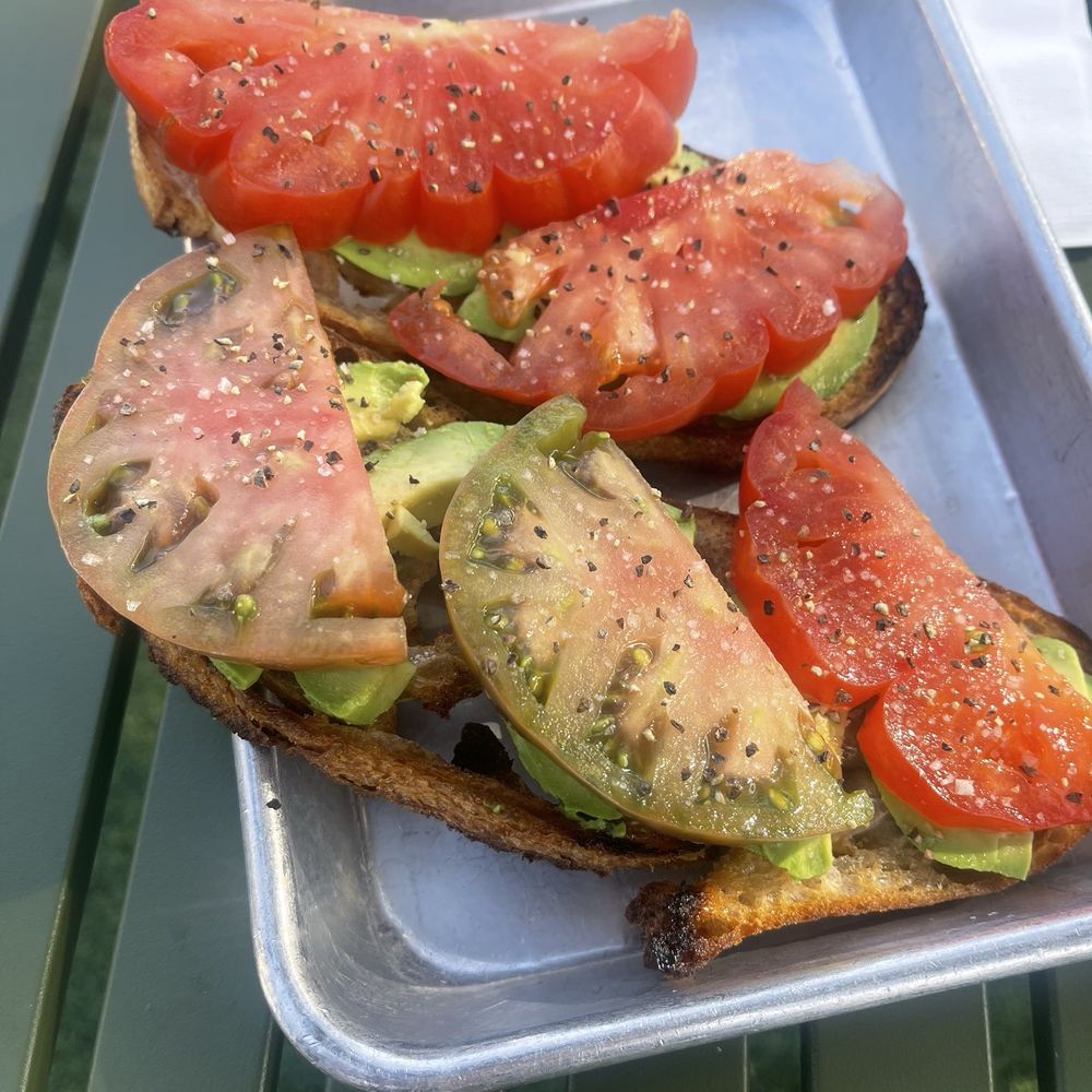 Revolution Roasters - Avocado and Halom tomatoes toast - Coffee Roasteries Near Me - Carlsbad, California