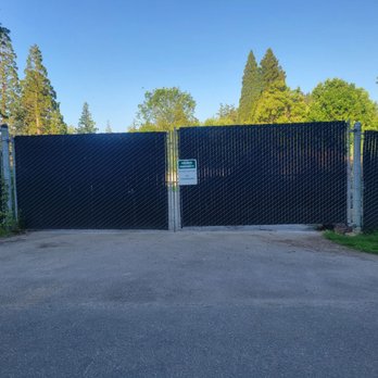 Fanno Creek Trail - Portland Golf Club big black tarped fence with sign to keep away, like anyone's going there from the trail lol. - Parks Near Me - Portland, Oregon Fanno Creek Trail - Portland Golf Club big black tarped fence with sign to keep away, like anyone's going there from the trail lol. - Parks Near Me - Portland, Oregon