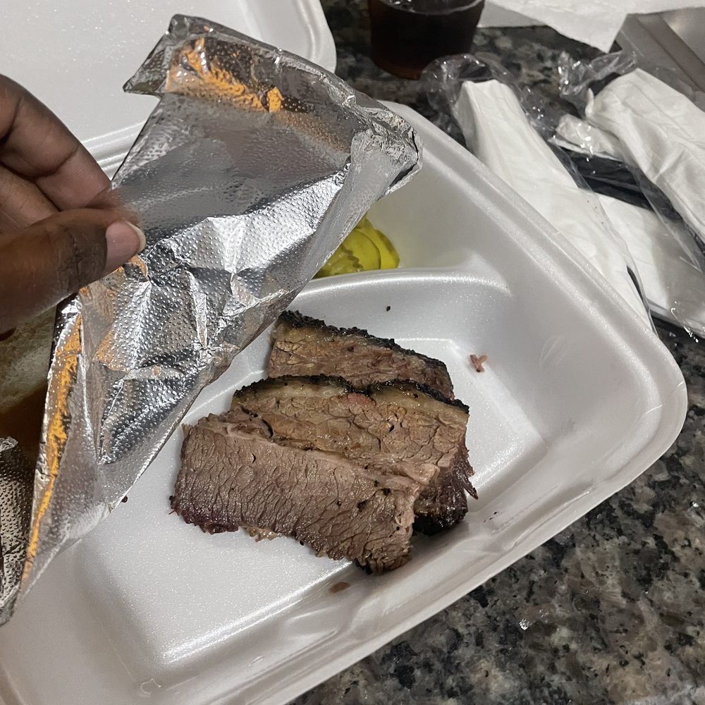 Miller's Smokehouse - Half pound of brisket with bread, pickles, & onions on the side. - Barbeque Near Me - Belton, Texas Miller's Smokehouse - Half pound of brisket with bread, pickles, & onions on the side. - Barbeque Near Me - Belton, Texas