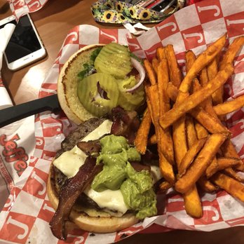Jefferson's - Guacamole Bacon Burger with Sweet Potato Fries - American Near Me - Lawrence, Kansas Jefferson's - Guacamole Bacon Burger with Sweet Potato Fries - American Near Me - Lawrence, Kansas