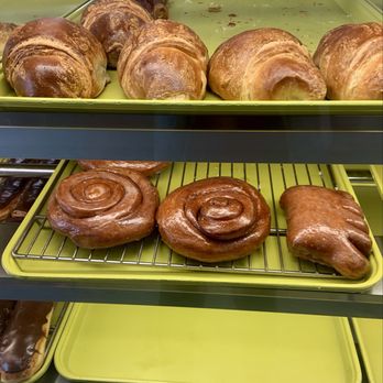 Jax Donut House - Chocolate long John donut, ham and cheese croissant, cinnamon bun, and bear claw - Donuts Near Me - Brea, California