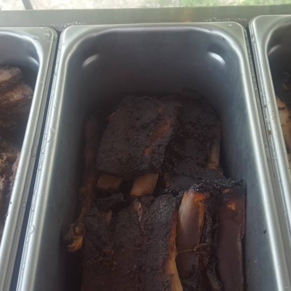Casadora Martinez - three pans of meat and potatoes - Food Trucks Near Me Casadora Martinez - three pans of meat and potatoes - Food Trucks Near Me