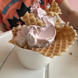 Strawberry banana in a waffle cup. Unfortunately I took the pick after eating started already. But it looked nice before. Strawberry banana in a waffle cup. Unfortunately I took the pick after eating started already. But it looked nice before.