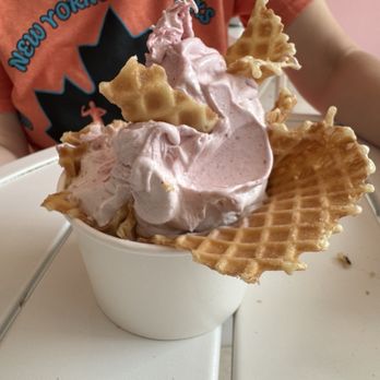 Scoop N Fruit - Strawberry banana in a waffle cup. Unfortunately I took the pick after eating started already. But it looked nice before. - Ice Cream & Frozen Yogurt Near Me - Glen Cove, New York