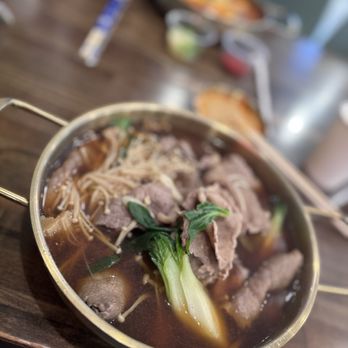 Mala Town - Garlic beef, with bok choy, enoki mushrooms, and sukiyaki broth - Hot Pot Near Me - Las Vegas, Nevada Mala Town - Garlic beef, with bok choy, enoki mushrooms, and sukiyaki broth - Hot Pot Near Me - Las Vegas, Nevada