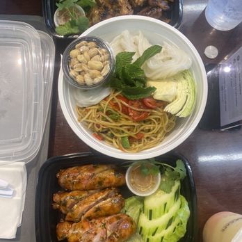 Cocomilk Cafe - Lao sausage, papaya & grilled chicken. Peach passion on the bottom right. - Laotian Near Me - Sacramento, California