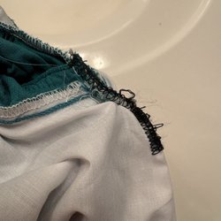 Jean's Alterations - Messy stitching