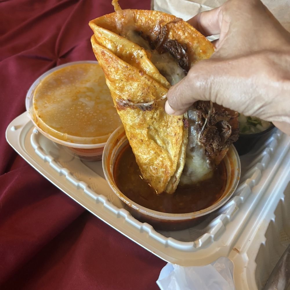 Los Tacos - Sauce w onions n cilantro added. Grab napkins.   Sooo juicy!! - Tacos Near Me - Carlsbad, California